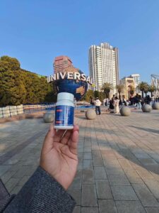 Myriad Capsules with Universal Studios Japan on the Background